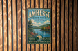 A vintage-style metal sign for Amherst State Park in New York, featuring a scenic landscape with a lake and mountains.