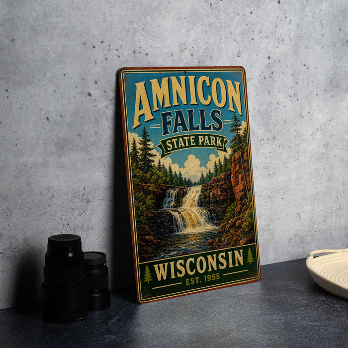 A vintage-style metal sign for Amnicon Falls State Park in Wisconsin, featuring a waterfall and forest scenery.