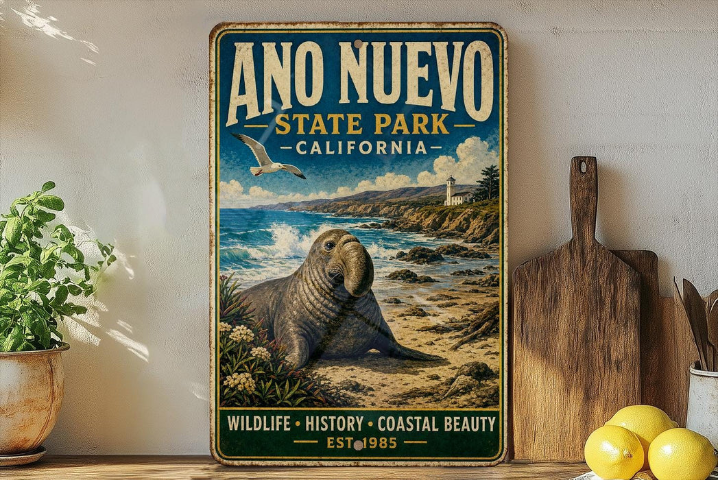 a vintage-style sign for Año Nuevo State Park, California, with a scenic illustration of a seal resting on the beach.