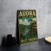 a vintage-style sign for Audra State Park, with a scenic illustration of a river and mountains in the background.