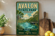 a vintage-style sign for the Florida State Park, with a scenic illustration of a river, palm trees, and a bridge. The sign is displayed on a shelf next to a wooden cutting board and some potted plants.