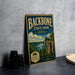 A vintage-style sign for Backbone State Park in Iowa, featuring a scenic landscape with a cliff overlooking a lake.
