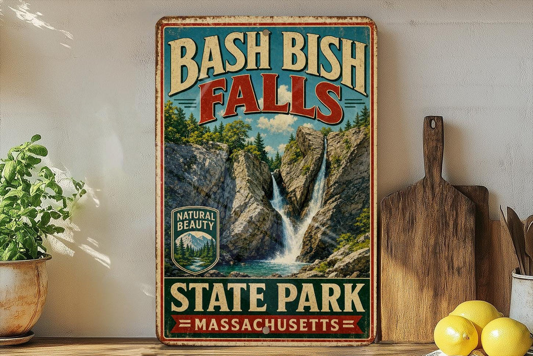 A vintage-style sign for Bash Bish Falls State Park in Massachusetts, featuring a scenic image of the waterfall surrounded by lush greenery.