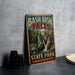 A vintage-style metal sign for the state park named "Bash Bish Falls" in Massachusetts, featuring a waterfall and forest scenery.