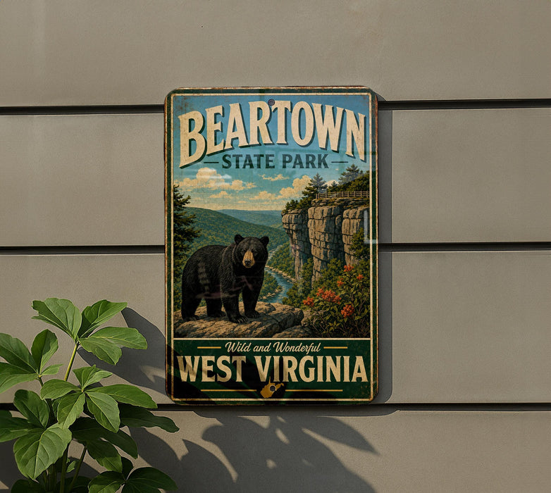 A vintage-style metal sign for Beartown State Park in West Virginia, featuring a black bear in a scenic landscape.