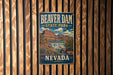 A vintage-style metal sign for Beaver Dam State Park in Nevada, featuring a scenic illustration of the park's landscape.
