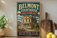 A vintage-style sign for Belmont Courthouse, a historic site in Nevada, featuring an illustration of a building with a porch and a sign that reads "Belmont Courthouse".