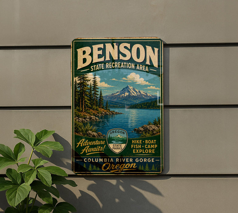 A vintage metal sign for the Oregon State Recreation Area, featuring a scenic mountain landscape with a river and pine trees.