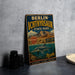 A vintage-style metal sign for Berlin-Ichthyosaur State Park, featuring an illustration of a dinosaur and a seascape.