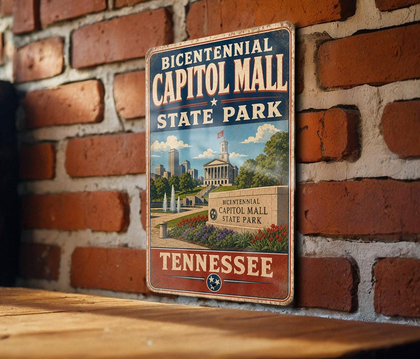 A vintage-style metal sign for the historic capitol mall in Tennessee, featuring a cityscape and the text "BICENTENNIAL CAPITOL MALL STATE PARK TENNESSEE".