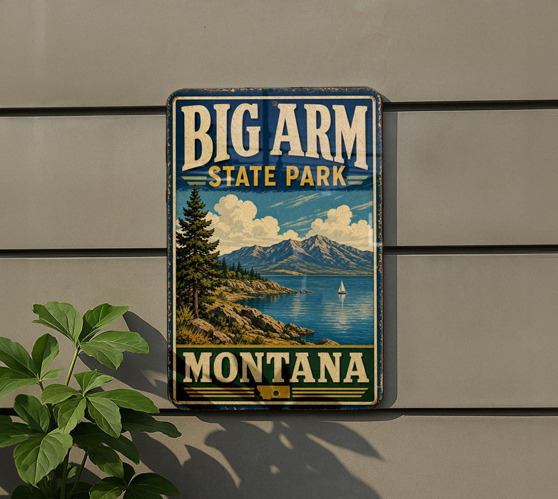 A vintage-style sign for Big Arm State Park in Montana, featuring a scenic landscape with mountains, a lake, and a sailboat.
