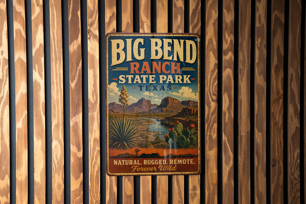 A vintage-style metal sign for Big Bend Ranch State Park in Texas, featuring a desert landscape with mountains, cacti, and a river.