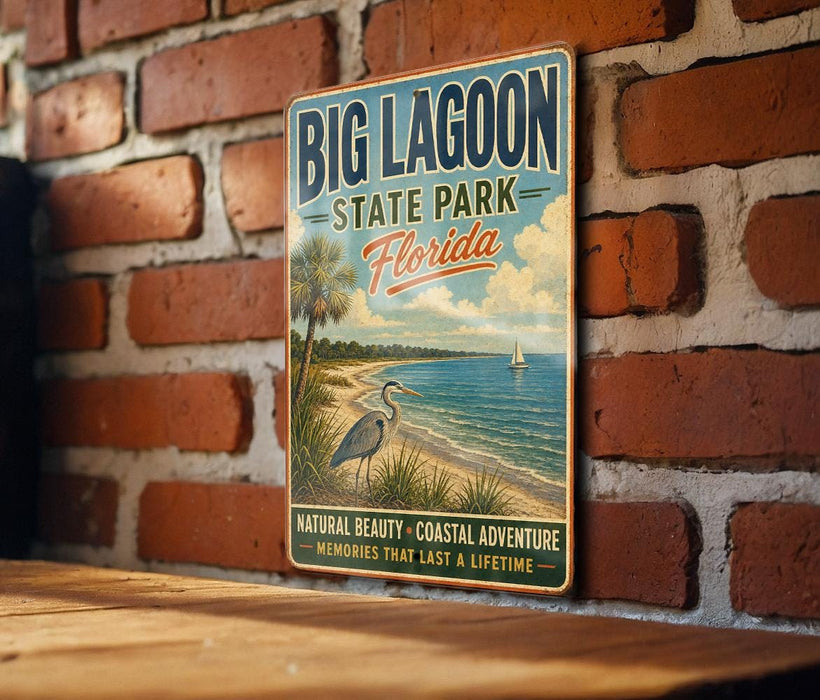 A vintage-style metal sign for Big Lagoon State Park in Florida, featuring a beach scene with a crane and palm trees.