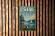 A vintage-style metal sign for Big Lake State Park in Missouri, featuring a sailboat on a lake and a scenic landscape.