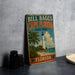 A vintage-style sign for Bill Bagg's Cape Florida State Park, featuring a lighthouse and palm trees, is displayed on a gray countertop.