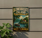 A vintage-style sign for Blennerhasselt Island, Historic State Park, West Virginia, featuring a scenic illustration of a river, houses, and boats.