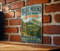 A vintage-style metal sign for Blue Mound State Park in Wisconsin, featuring a scenic mountain landscape and the text "Naturally Beautiful" and "Adventure, Relaxation, Memories".