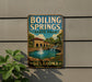 A vintage-style sign for Boiling Springs State Park in Oklahoma, featuring a scenic illustration of a waterfall and a building.