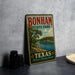 A vintage-style metal sign for Bonham State Park in Texas, featuring a scenic landscape with a lake and trees.