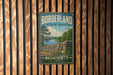 A vintage metal sign for Borderland State Park in Massachusetts, featuring a scenic landscape with a lake, trees, and a stone wall.