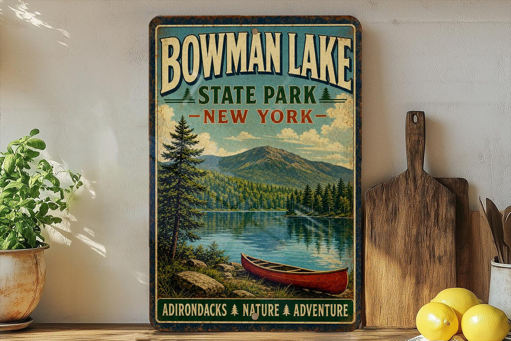 A vintage-style sign for Bowman Lake State Park in New York, featuring a scenic image of a lake, pine trees, and a canoe.