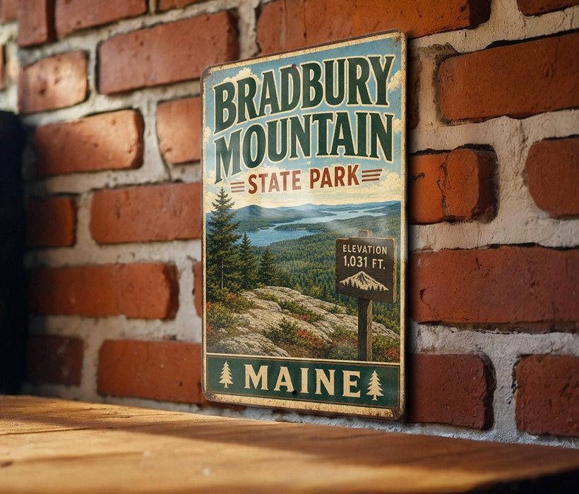 A vintage metal sign for Bradbury Mountain State Park in Maine, featuring a scenic landscape with pine trees and mountains.
