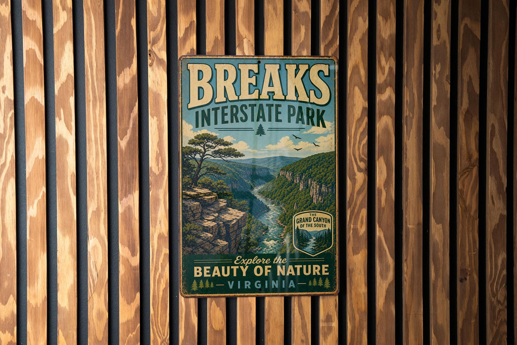 A vintage-style metal sign for "BREAKS INTERSTATE PARK" is displayed on a wooden wall, featuring a scenic mountain landscape with a river and pine trees.
