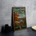 A vintage-style sign for Brown County State Park in Indiana, featuring a scenic landscape with trees and a river.