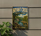 A vintage-style sign for Bryant Creek State Park in Missouri, featuring a scenic illustration of the creek surrounded by lush greenery.