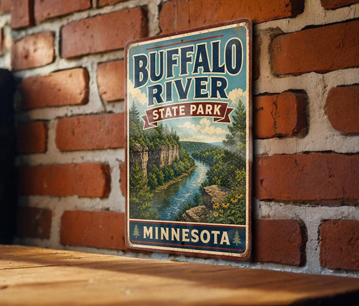 A vintage-style metal sign for Buffalo River State Park in Minnesota, featuring a scenic illustration of the river surrounded by lush greenery.