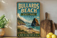 A vintage-style sign for Bullards Beach State Park in Oregon, featuring a scenic illustration of the beach and mountains.