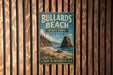 A vintage metal sign for Bullards Beach State Park in Oregon, featuring a scenic illustration of the beach and surrounding landscape.