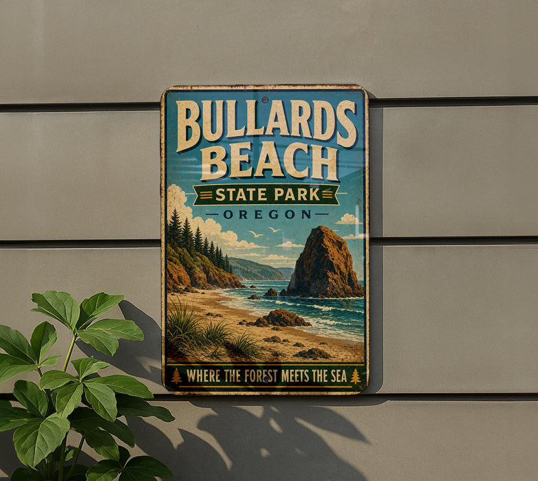 A vintage-style metal sign for Bullards Beach State Park in Oregon, featuring a scenic landscape with a rocky outcrop, beach, and ocean.