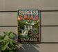 A vintage-style sign forBURGEOUS FALLS STATE PARK in Tennessee, featuring a waterfall and lush greenery.