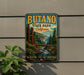 A vintage-style metal sign for Butano State Park, California, featuring a scenic landscape with a river, mountains, and trees.