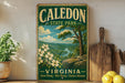 A vintage-style metal sign for Caledon State Park in Virginia, featuring a scenic landscape with a river, trees, and flowers.