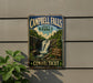 A vintage metal sign for Campbell Falls State Park in Connecticut, featuring a waterfall and forest scenery.