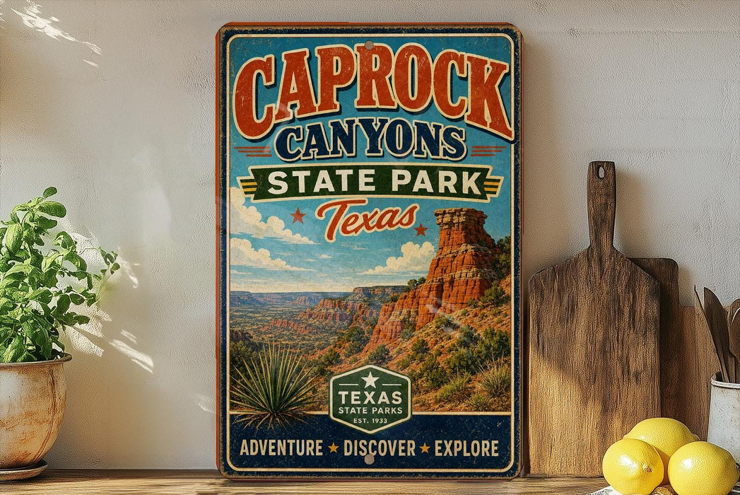 A vintage-style sign for Caprock Canyon State Park in Texas, featuring a desert landscape with a rock formation and a pine tree.