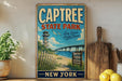 A vintage-style metal sign for Captree State Park in New York, featuring an illustration of a bridge, beach, and birds.