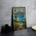 A vintage metal sign for Captree State Park in New York, featuring a scenic illustration of the park and its surroundings.