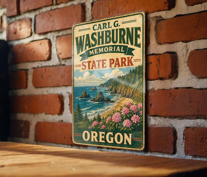 A vintage metal sign for Carl G. Washburne Memorial State Park in Oregon, featuring a scenic landscape with mountains, cliffs, and a body of water.