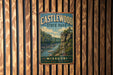 A vintage-style metal sign for Castlewood State Park in Missouri, featuring a scenic landscape with a river and mountains.