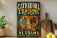 A vintage-style sign for Cathedral Caves State Park in Alabama, featuring an illustration of the cave system.