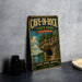 A vintage-style metal sign for Cave-in-Rock State Park in Illinois, featuring a scenic illustration of a cave surrounded by trees and a lake.