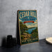 A vintage-style metal sign for Cedar Hill State Park in Texas, featuring a scenic landscape with a lake, mountains, and trees.