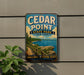 A vintage-style metal sign for Cedar Point State Park in New York, featuring a scenic landscape with a lake and cliffs.