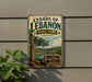 A vintage-style metal sign for Cedar's of Lebanon State Park in Tennessee, featuring a scenic landscape with a tree and a lake.
