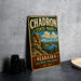 A vintage-style metal sign for Chadron State Park in Nebraska, featuring a scenic landscape with mountains, trees, and a lake.