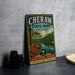 A vintage-style metal sign for Cheraw State Park in South Carolina, featuring a scenic landscape with a lake, trees, and a pier.