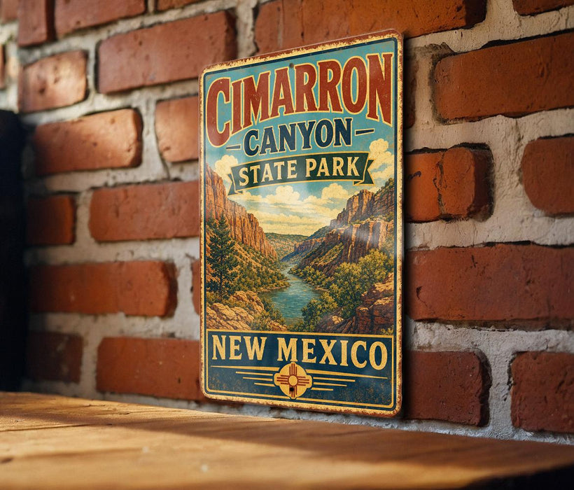 A vintage-style metal sign for Cimarron Canyon State Park in New Mexico, featuring a scenic landscape with mountains and a river.